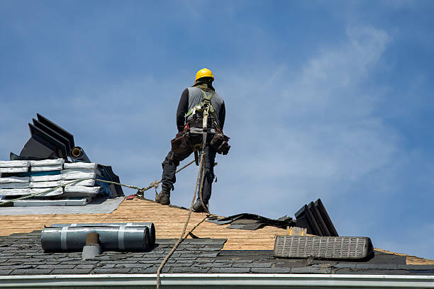 Professional Gutter Installation technician working in Warner, NH